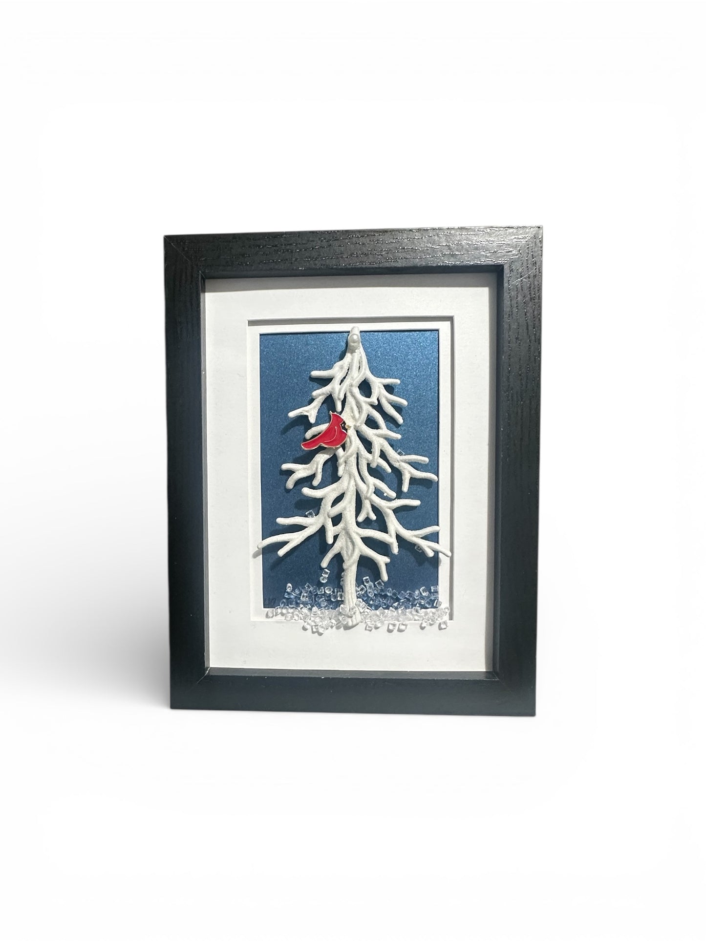 Beautiful Cardinal in a Winter White Tree